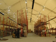 Plastic sheeting covered fabric building.jpg